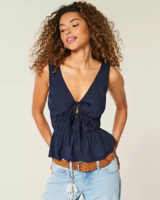 Top z mieszanki lnu i wiązaniem z przodu